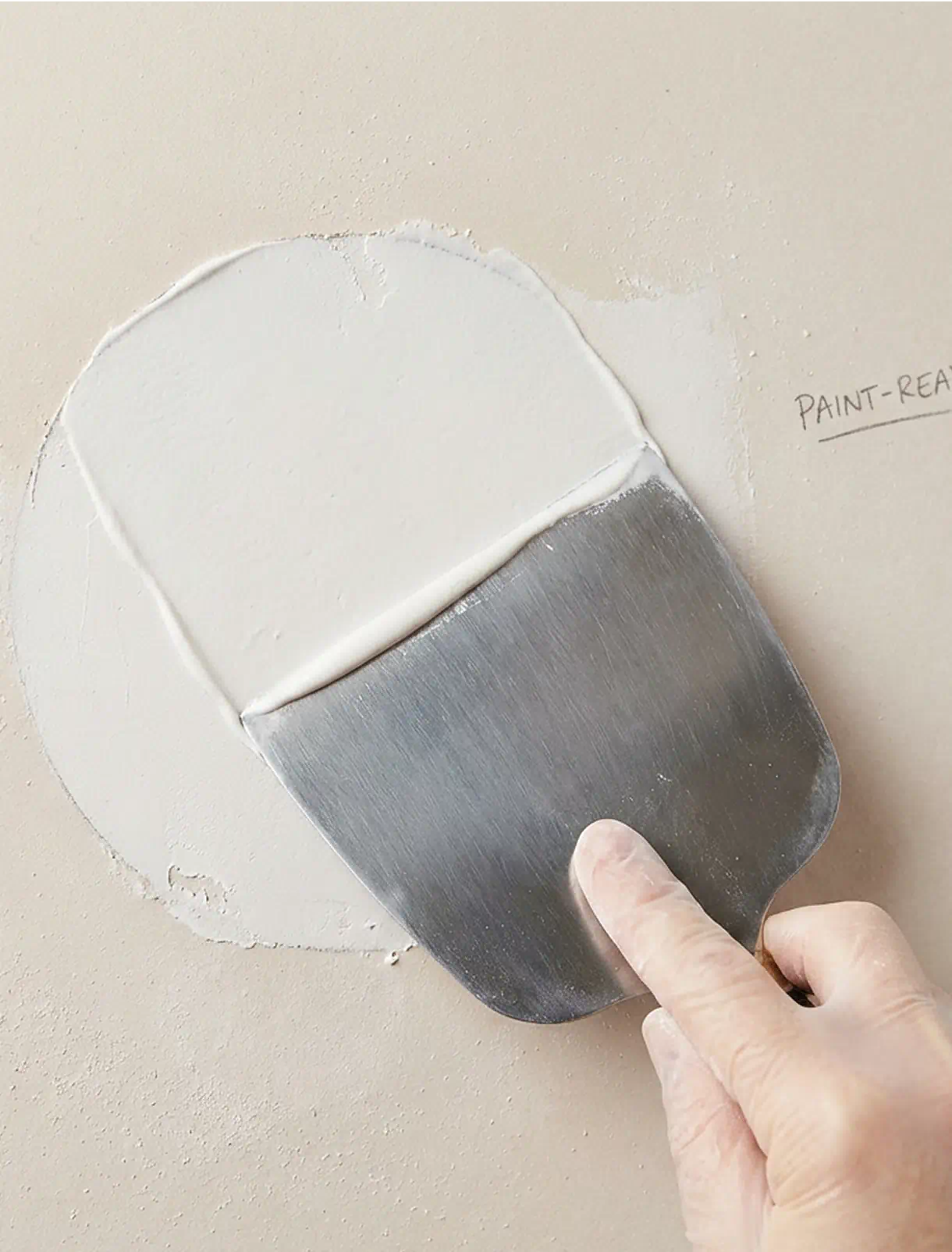 Smooth drywall patch ready for primer and paint