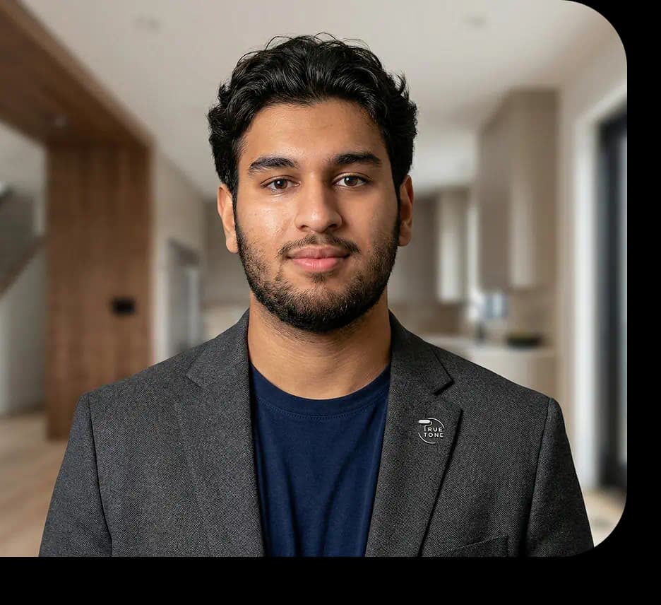 Exterior paint roller leaving a fresh coat of white